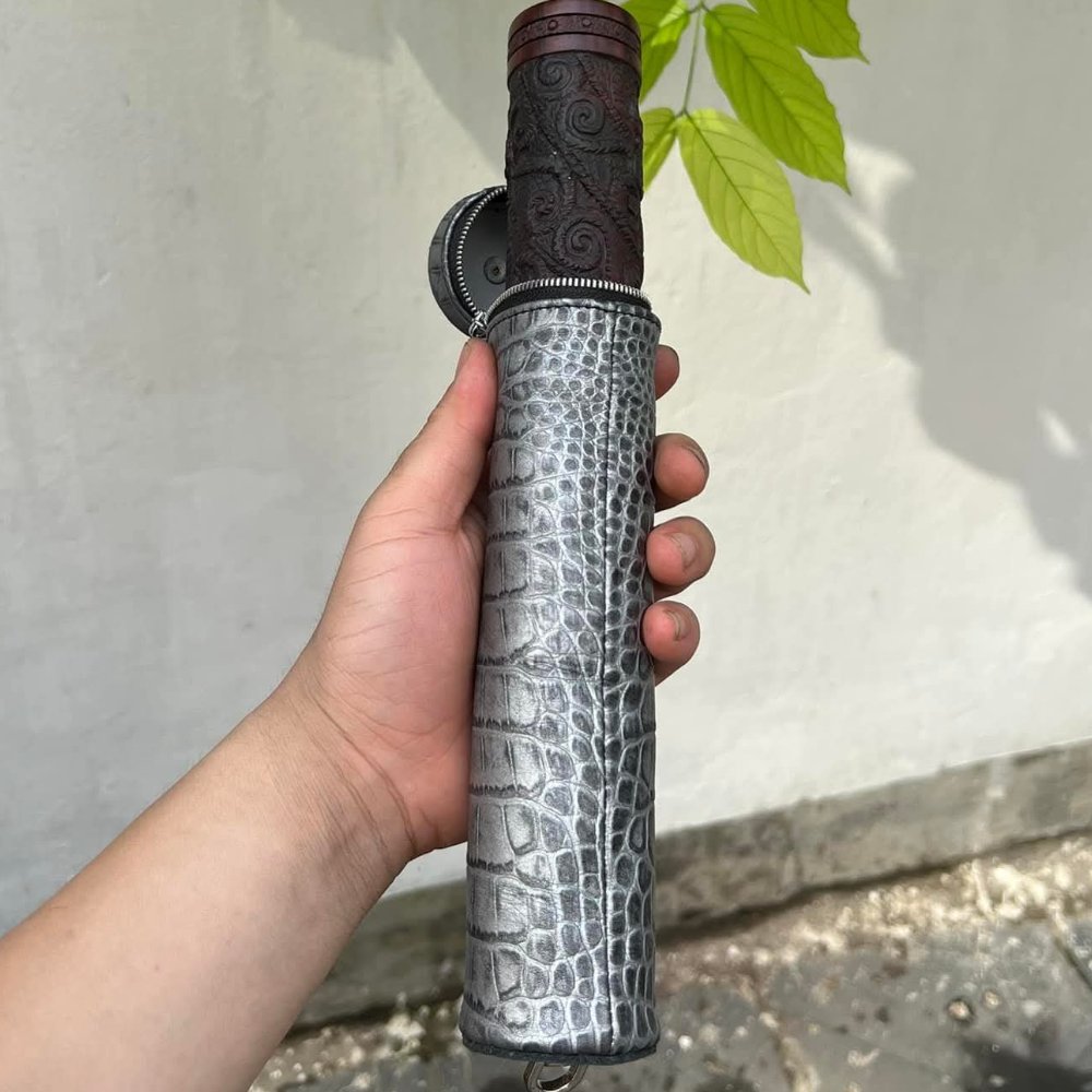 Đựng côn - da cá sấu